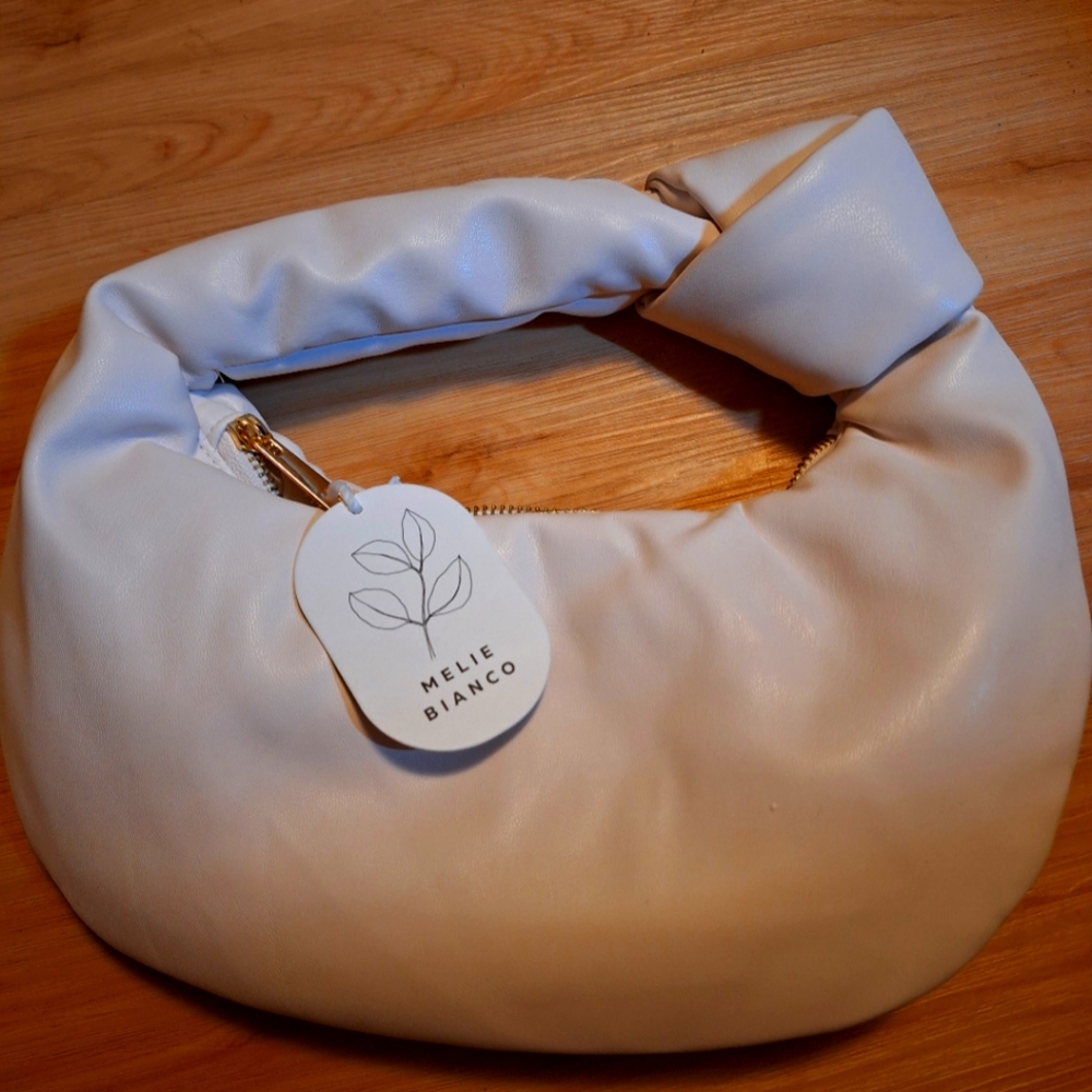 Melie Bianco knot clutch bag